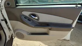 Chevrolet 22677488 04-05 New Style Malibu Passenger Right Front Door Panel Wth Switches Neutral 52e