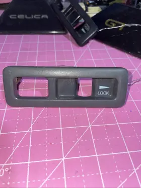 Toyota 69762-14010 Supra Mk3 1986.5-90 Drivers Side Door Lock Bezel Grey Toyota 69762-14010 Supra Mk3 1986.5-90 Drivers Side Door Lock Bezel Grey